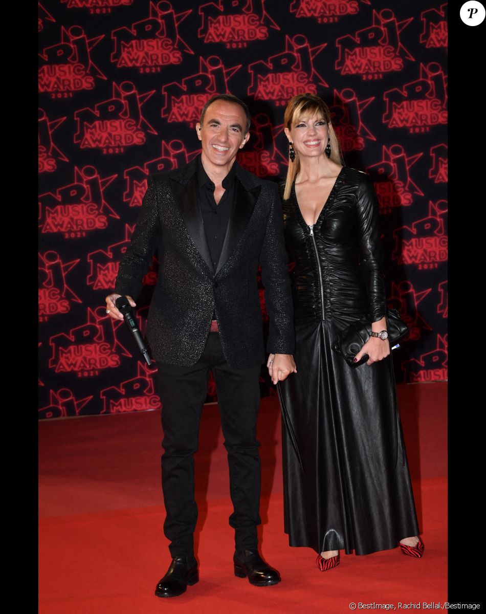 Nikos Aliagas et sa compagne Tina Grigoriou lors de la 23ème édition des NRJ Music Awards 2021 au Palais des Festivals de Cannes, le 20 novembre 2021. © Rachid Bellak/Bestimage