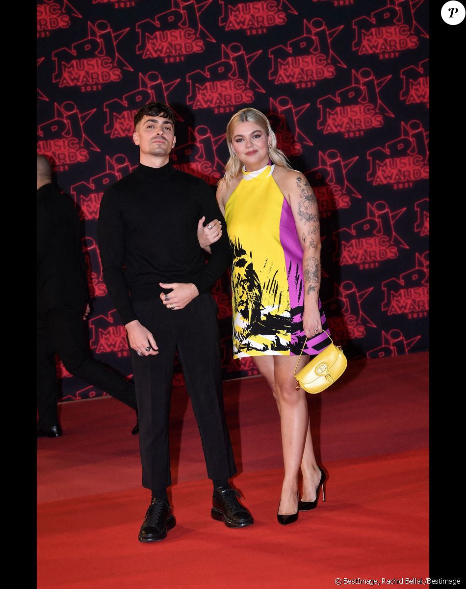 Florian Rossi et sa compagne Louane Emera lors de la 23ème édition des NRJ Music Awards 2021 au Palais des Festivals de Cannes, le 20 novembre 2021. © Rachid Bellak/Bestimage