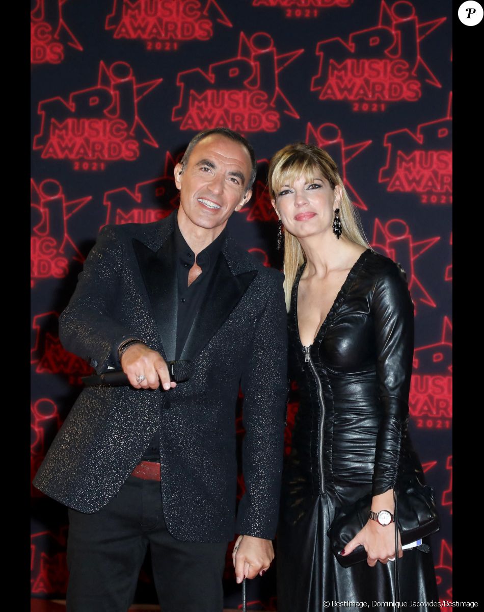 Nikos Aliagas et sa compagne Tina Grigoriou lors de la 23ème édition des NRJ Music Awards 2021 au Palais des Festivals de Cannes, le 20 novembre 2021. © Dominique Jacovides/Bestimage