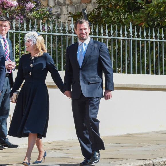 Le prince Harry, duc de Sussex, Peter Phillips et Autumn Phillips arrivent pour assister à la messe de Pâques à la chapelle Saint-Georges du château de Windsor, le 21 avril 2019.