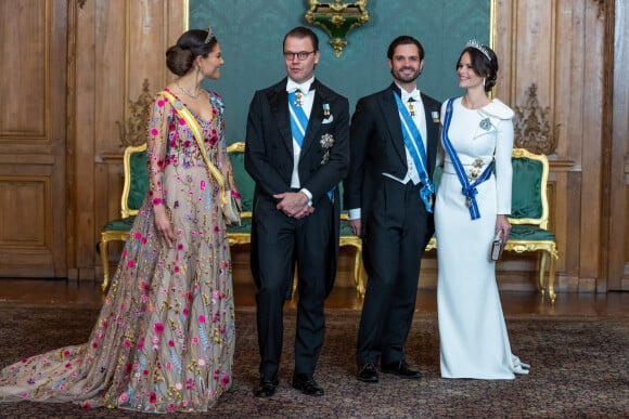 La princesse Victoria de Suède, le prince Daniel, le prince Carl Philip, la princesse Sofia lors du dîner d'état au palais royal à Stockholm pour la visite en Suède du couple royal d'Espagne.