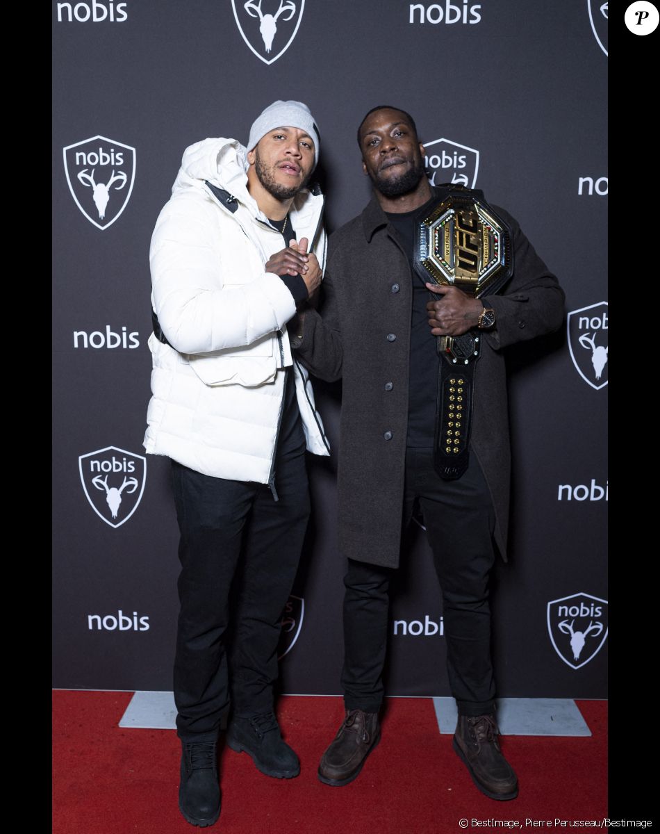 Exclusif - Ciryl Gane (Champion du Monde de MMA poids lourd) et guest - Nobis fête ses 15 ans en inaugurant sa nouvelle boutique dans le 2ème arrondissement de Paris, France, le 25 novembre 2021. © Pierre Perusseau/Bestimage$