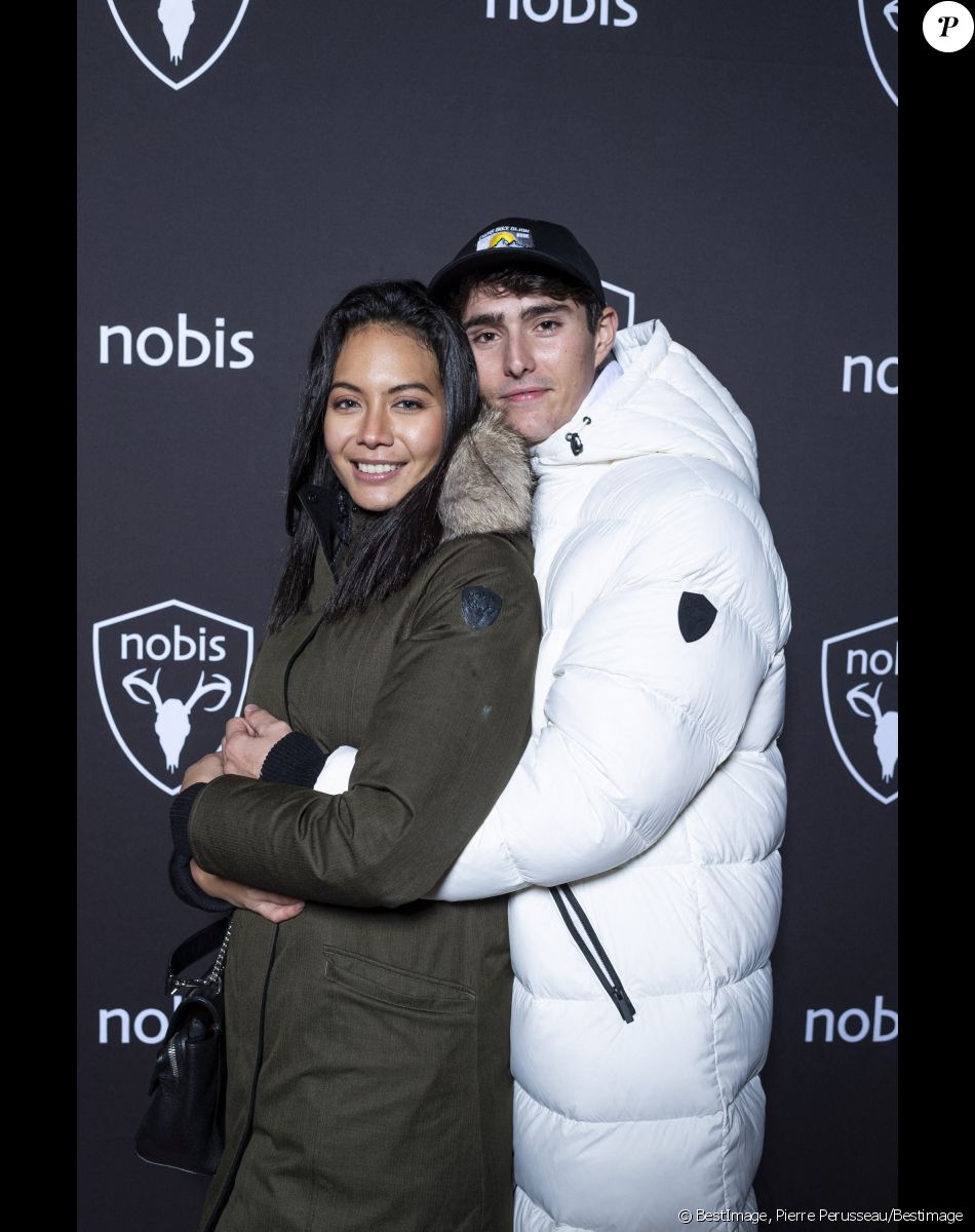 Exclusif - Vaimalama Chaves (Miss France 2019) et son compagnon Nicolas Fleury - Nobis fête ses 15 ans en inaugurant sa nouvelle boutique dans le 2ème arrondissement de Paris, France, le 25 novembre 2021. © Pierre Perusseau/Bestimage$