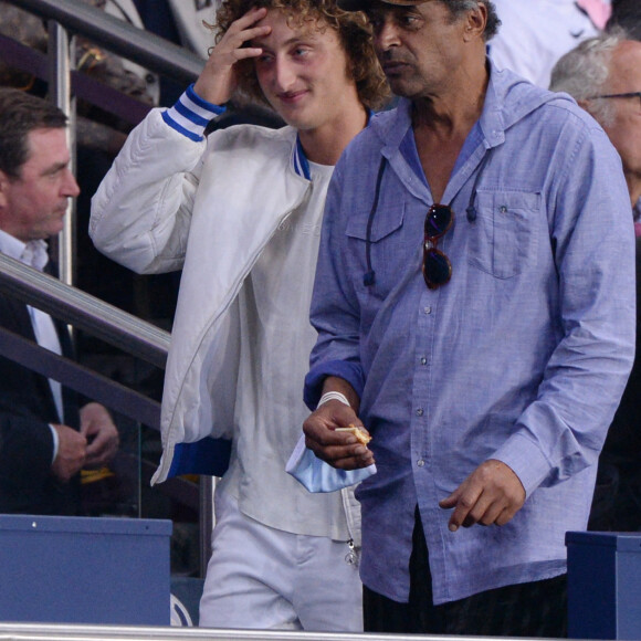 Yannick Noah et son fils Joalukas - People en tribunes du match de football en ligue 1 Uber Eats : Le PSG (Paris Saint-Germain) remporte la victoire 2-1 contre Lyon au Parc des Princes à Paris le 19 septembre 2021.