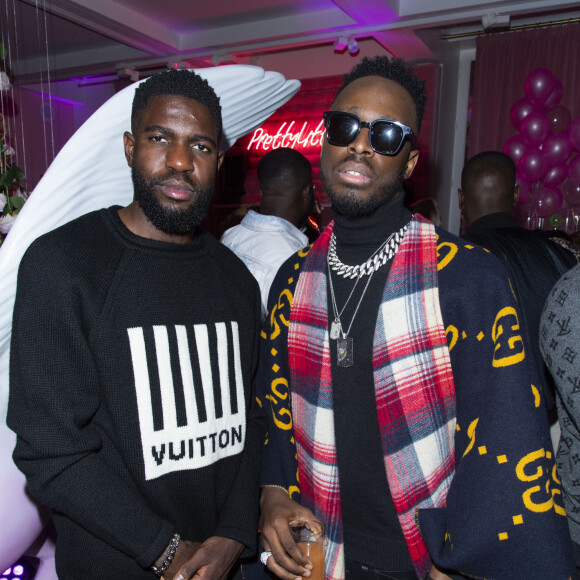 Exclusif - Samuel Umtiti et Dadju lors de l'ouverture du tout nouveau showroom parisien PrettyLittleThing parrainée par Sananas, rue Saint-Florentin dans le 8ème arrondissement de Paris, France, le 3 mars 2020, en marge de la semaine de la mode de Paris. © Pierre Perusseau/Bestimage