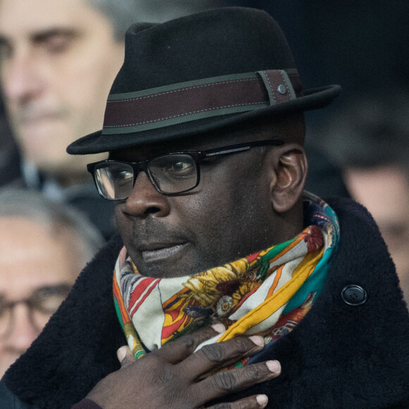 Lilian Thuram dans les tribunes lors du match de Ligue 1 "PSG - Nantes (2-0)" au Parc des Princes. © Cyril Moreau/Bestimage