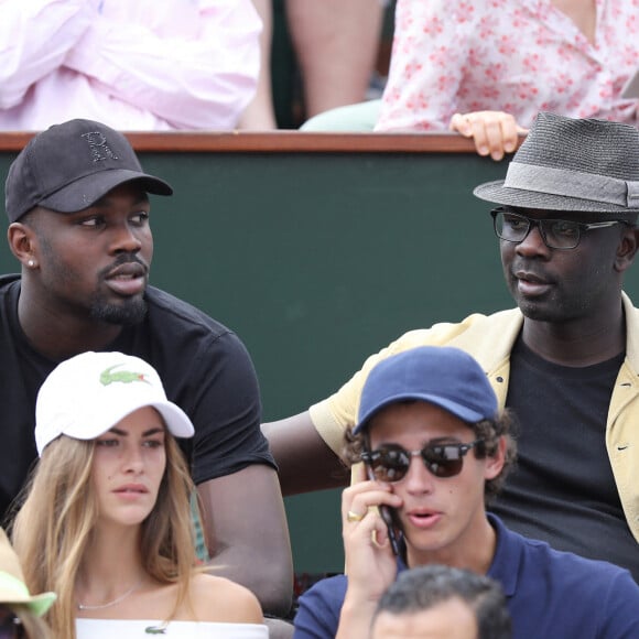 Lilian Thuram et son fils Marcus - People dans les tribunes des Internationaux de France de Tennis de Roland Garros à Paris le 2 juin 2018. © Dominique Jacovides-Cyril Moreau / Bestimage