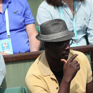 Lilian Thuram et son fils Marcus Thuram - People dans les tribunes lors des Internationaux de France de Tennis de Roland-Garros à Paris le 2 juin 2018. © Dominique Jacovides-Cyril Moreau / Bestimage