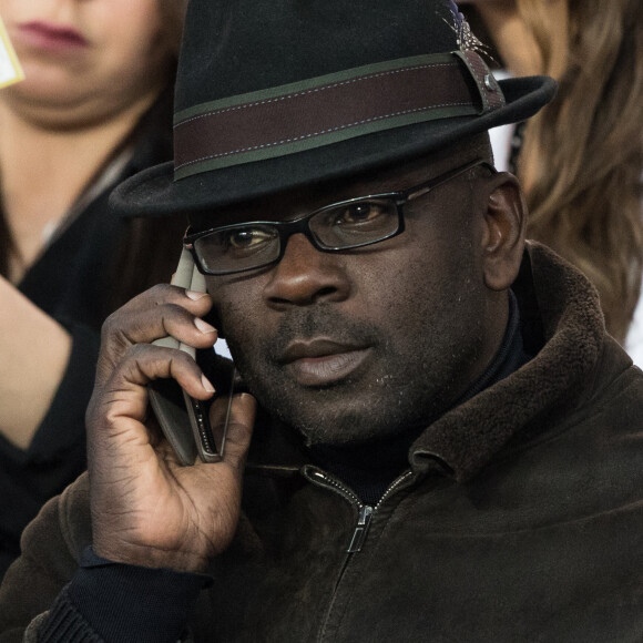 Lilian Thuram regarde son fils Marcus (évoluant au poste d'attaquant à l'En Avant de Guingamp) - Célébrités dans les tribunes du parc des princes lors du match de football de ligue 1, le Paris Saint-Germain (PSG) contre En Avant de Guingamp (EAG) à Paris, France, le 29 avril 2018. Paris et Guingamp ont fait match nul 2 - 2. © Cyril Moreau/Bestimage
