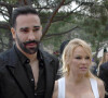 Pamela Anderson et son compagnon Adil Rami lors de la soirée Amber Lounge Monaco 2019 au profit de la fondation de Jackie Stewart "Race Against Dementia" à l'hôtel Méridien Beach Plaza à Monaco, le 24 mai 2019.