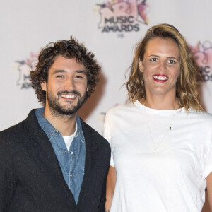 Laure Manaudou et Jérémy Frérot - Arrivées à la 17ème cérémonie des NRJ Music Awards 2015 au Palais des Festivals à Cannes.