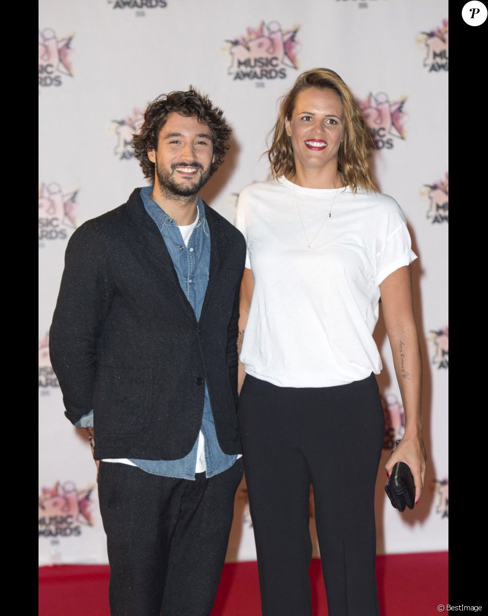 Laure Manaudou et Jérémy Frérot - Arrivées à la 17ème cérémonie des NRJ Music Awards 2015 au Palais des Festivals à Cannes.