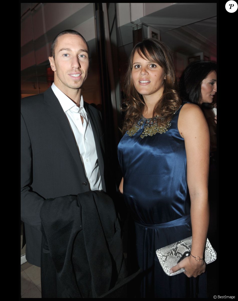 Frédérick Bousquet et Laure Manaudou - Dîner de gala de la mode contre le sida au Pavillon d'Armenonville le 28 janvier 2010.