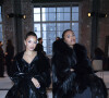 Amina Muaddi et Tina Kunakey assistent au défilé Alexandre Vauthier, collection Haute Couture printemps-été 2022. Paris, le 25 janvier 2022.