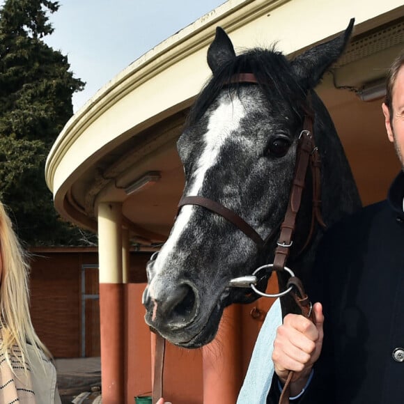 Exclusif - Alain Bernard et sa compagne Faustine ont découvert en amoureux l'univers des courses hippiques - Journée caritative au profit de la Fondation Claude Pompidou à l'Hippodrome de la Côte d'Azur à Cagnes-sur-Mer, le 11 février 2018. © Bruno Bebert/LMS/Bestimage