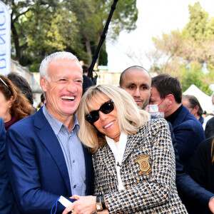 Didier Deschamps et Brigitte Macron durant la clôture nationale de l'opération Pièces Jaunes 2022, sur la colline du Château à Nice. © Bruno Bebert / Bestimage