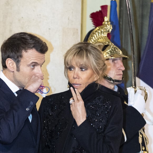 Le président Emmanuel Macron et Brigitte Macron - Arrivées au dîner offert par le président de la République en l'honneur de M. Marcelo Rebelo de Sousa, Président de la République portugaise au palais de l'Elysée à Paris le 11 février 2022.