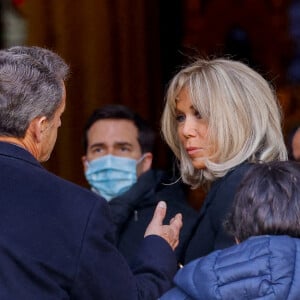 Brigitte Macron, Nicolas Sarkozy - Obsèques de Jean-Pierre Pernaut en la Basilique Sainte-Clotilde à Paris le 9 mars 2022.