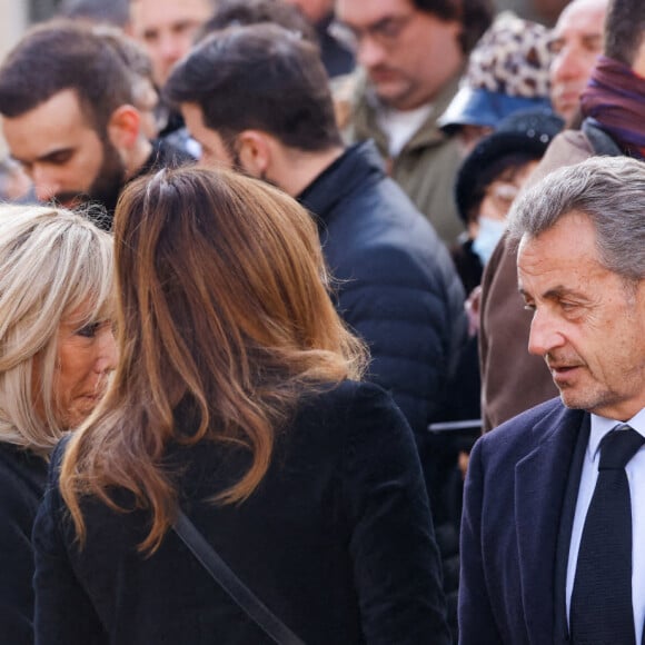 Brigitte Macron, Carla Bruni, Nicolas Sarkozy - Obsèques de Jean-Pierre Pernaut en la Basilique Sainte-Clotilde à Paris le 9 mars 2022.