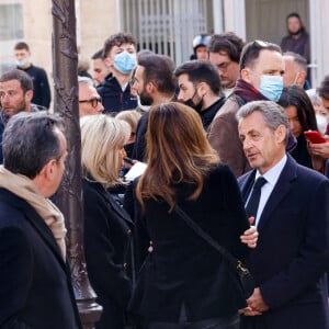 Brigitte Macron, Carla Bruni-Sarkozy, Nicolas Sarkozy - Obsèques de Jean-Pierre Pernaut en la Basilique Sainte-Clotilde à Paris le 9 mars 2022.
