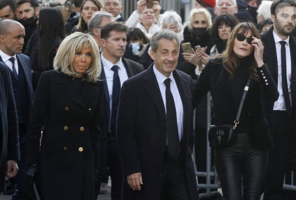 Brigitte Macron, Nicolas Sarkozy et sa femme Carla Bruni-Sarkozy - Obsèques de Jean-Pierre Pernaut en la Basilique Sainte-Clotilde à Paris le 9 mars 2022. © Denis Guignebourg/ Bestimage