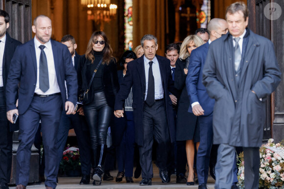Carla Bruni, Nicolas Sarkozy, Brigitte Macron - Sorties des obsèques de Jean-Pierre Pernaut en la Basilique Sainte-Clotilde à Paris le 9 mars 2022. © Cyril Moreau/Bestimage