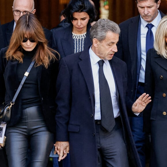 Carla Bruni, Nicolas Sarkozy, Brigitte Macron - Sorties des obsèques de Jean-Pierre Pernaut en la Basilique Sainte-Clotilde à Paris le 9 mars 2022. © Cyril Moreau/Bestimage