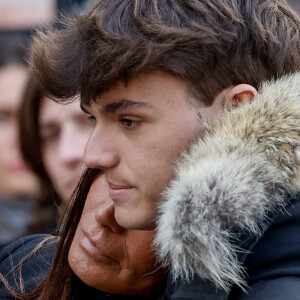 Nathalie Marquay et son fils Tom - La famille de Jean-Pierre Pernaut à la sortie des obsèques en la Basilique Sainte-Clotilde à Paris le 9 mars 2022. © Cyril Moreau/Bestimage