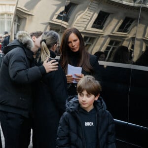Nathalie Marquay, Léo, petit fils de Jean-Pierre Pernaut - Sorties des obsèques de Jean-Pierre Pernaut en la Basilique Sainte-Clotilde à Paris le 9 mars 2022. © Christophe Clovis / Bestimage