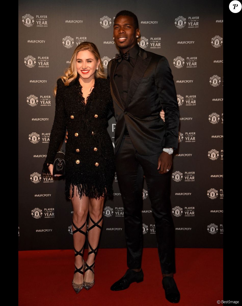 Paul Pogba et sa compagne Maria Salaues lors de la soirée du prix du joueur de l'année de Manchester United 2019 au stade Old Trafford à Manchester, Royaume Uni, le 9 mai 2019.