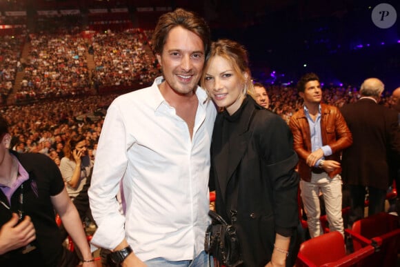 Vincent Cerutti et sa compagne Lavinia - Concert de Johnny Hallyday au POPB de Bercy à Paris. Le 15 juin 2013.