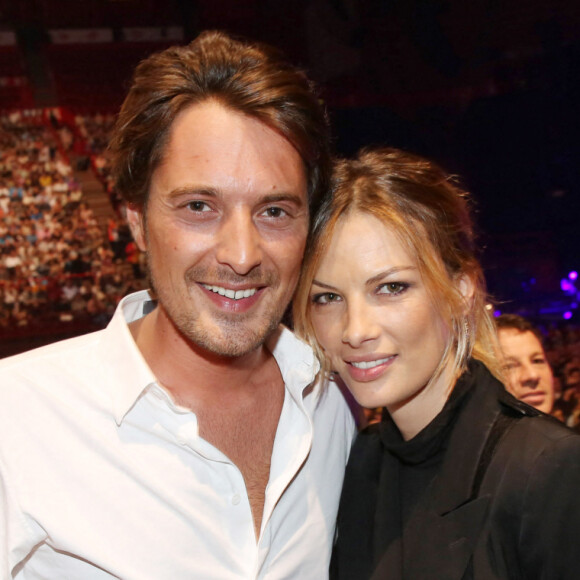 Vincent Cerutti et sa compagne Lavinia - Concert de Johnny Hallyday au POPB de Bercy à Paris. Le 15 juin 2013.