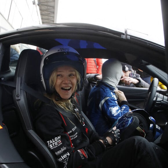 Sylvie Testud - 3e édition du challenge automobile "Talon Piste, Woman Charity Racing Challenge" au Circuit Bugatti du Mans. Le 20 mars 2022. © Denis Guignebourg / Bestimage