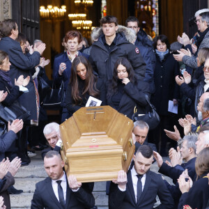 Nathalie Marquay et ses enfants Lou et Tom, guest - La famille de Jean-Pierre Pernaut à la sortie des obsèques en la Basilique Sainte-Clotilde à Paris le 9 mars 2022. © Cyril Moreau/Bestimage