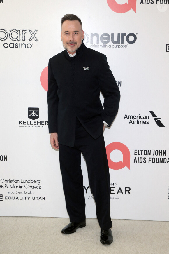 David Furnish au photocall de la soirée "Elton John AIDS Foundation" lors de la 94ème édition de la cérémonie des Oscars à Los Angeles, le 27 mars 2022.