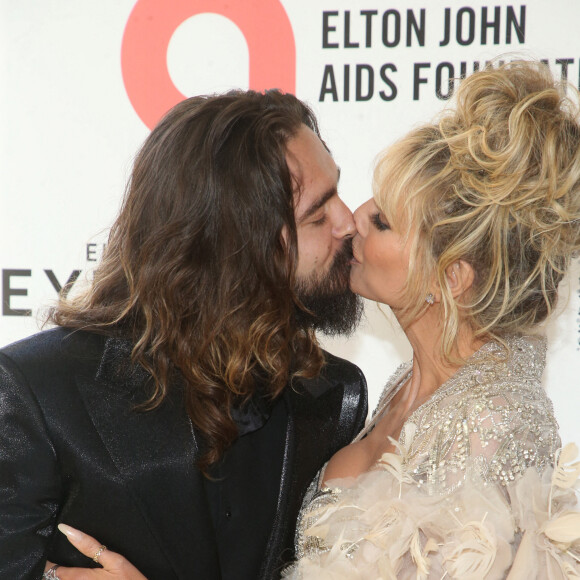 Heidi Klum et Tom Kaulitz au photocall de la soirée "Elton John AIDS Foundation" lors de la 94ème édition de la cérémonie des Oscars à Los Angeles, le 27 mars 2022.