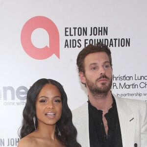 Christina Milian et Matt Pokora à la soirée organisée par Elton John en faveur de la AIDS Foundation, en marge des Oscars, le 27 mars 2022 à Los Angeles.