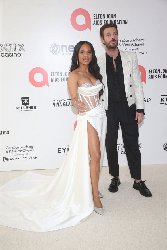 Christina Milian et Matt Pokora à la soirée organisée par Elton John en faveur de la AIDS Foundation, en marge des Oscars, le 27 mars 2022 à Los Angeles.