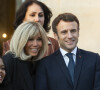 Brigitte et Emmanuel Macron au palais de l'Elysée dans le cadre de la journée internationale des droits des Femmes