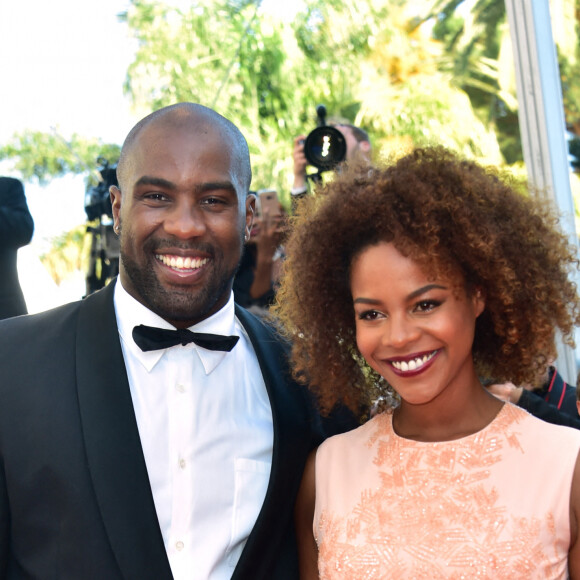 Teddy Riner et sa compagne Luthna - Montée des marches du film "Elle" lors du 69ème Festival International du Film de Cannes. Le 21 mai 2016. © Giancarlo Gorassini/Bestimage