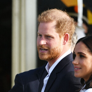 Le prince Harry, duc de Sussex, et Meghan Markle, duchesse de Sussex assistent à un engagement à la veille des Jeux Invictus 2020 aux Pays-Bas, à La Haye, le 15 avril 2022. 