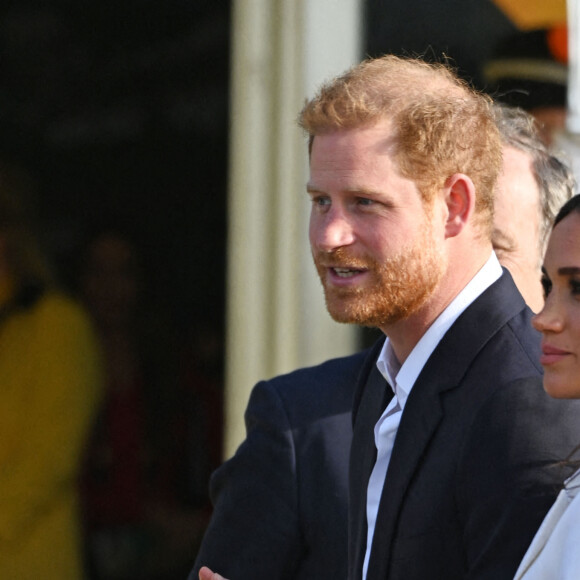 Le prince Harry, duc de Sussex, et Meghan Markle, duchesse de Sussex assistent à un engagement à la veille des Jeux Invictus 2020 aux Pays-Bas, à La Haye, le 15 avril 2022. 