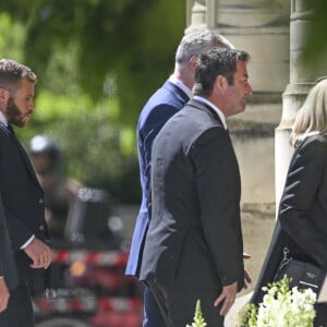 La Première Dame française, Brigitte Macron, Bruno Le Maire, ministre de l'Economie et des Finances et des Finances et Karl Olive, maire de Poissy - Obsèques d'Antoine Alléno (fils du chef cuisinier français, trois étoiles au Guide Michelin Yannick Alléno) en la collégiale Notre-Dame de Poissy, France, le 13 mai 2022. © Jean-Baptiste Autissier/Panoramic/Bestimage 