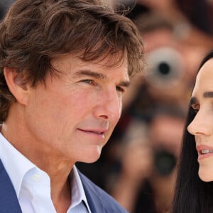 Tom Cruise et Jennifer Connelly au photocall de "Top Gun: Maverick " lors du 75ème Festival International du Film de Cannes, le 18 mai 2022. © Dominique Jacovides / Bestimage 