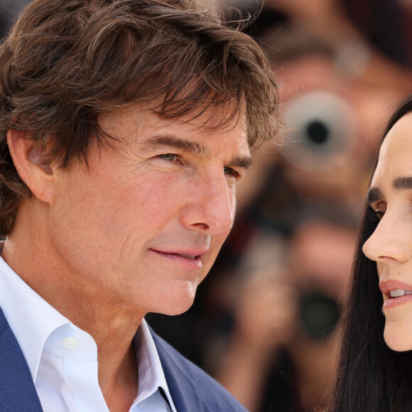 Tom Cruise et Jennifer Connelly au photocall de "Top Gun: Maverick " lors du 75ème Festival International du Film de Cannes, le 18 mai 2022. © Dominique Jacovides / Bestimage 