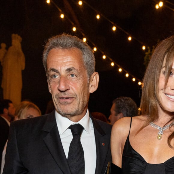 Carla Bruni et son mari Nicolas Sarkozy - Personnalités à la soirée "Women In Motion" par Kering au Château de la Castre lors du 75ème Festival International du Film de Cannes. Le 22 mai 2022 © Olivier Borde / Bestimage