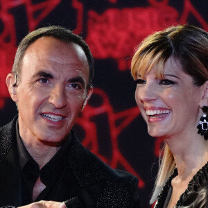 Nikos Aliagas et sa compagne Tina Grigoriou lors de la 23ème édition des NRJ Music Awards 2021 au Palais des Festivals de Cannes, le 20 novembre 2021. 