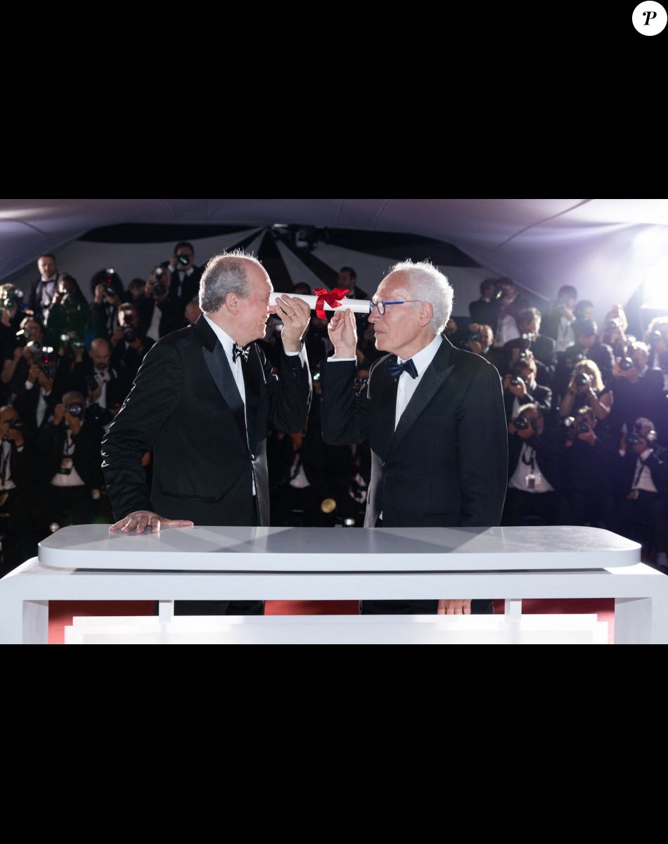 Jean-Pierre et Luc Dardenne (Prix du 75e anniversaire pour " Tori et Lokita ") - Photocall de la remise des palmes lors de la cérémonie de clôture du 75ème Festival International du Film de Cannes. Le 28 mai 2022