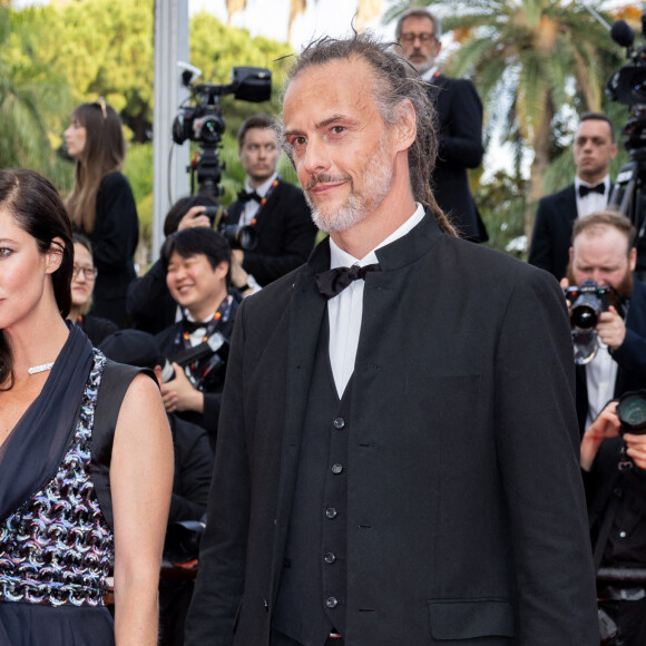 Anna Mouglalis et son compagnon - Montée des marches pour la cérémonie de clôture du 75ème Festival International du Film de Cannes. Le 28 mai 2022 © Olivier Borde / Bestimage