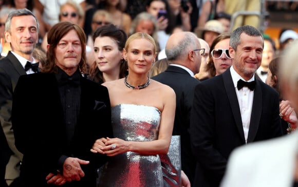 Diane Kruger, accompagné de son amoureux Norman Reedus, juste à côté de Guillaume Canet - Montée des marches pour la cérémonie de clôture du 75ème Festival International du Film de Cannes. Le 28 mai 2022